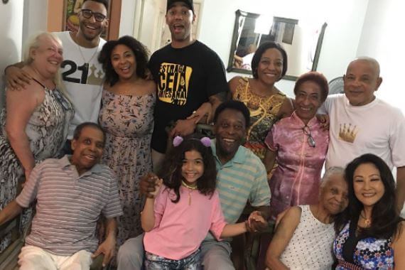 Pele and Marcia Aoki with family celebrating Christmas in 2017.